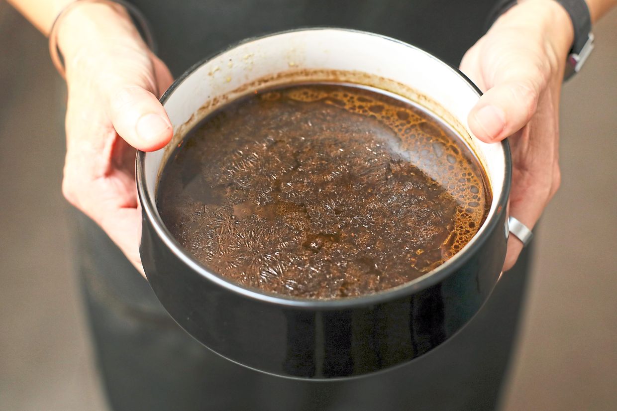 Law uses the trimmings collected from the secondary cuts to make a potent beef stock.