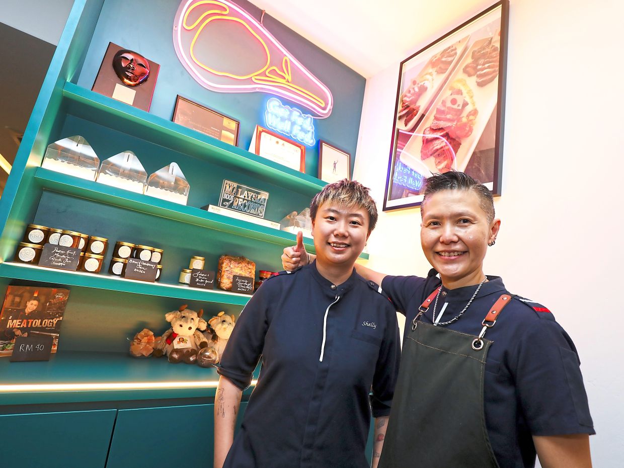 Saw (left) and Law made it into the Malaysia Book of Records for serving the highest number of secondary steaks on a menu.