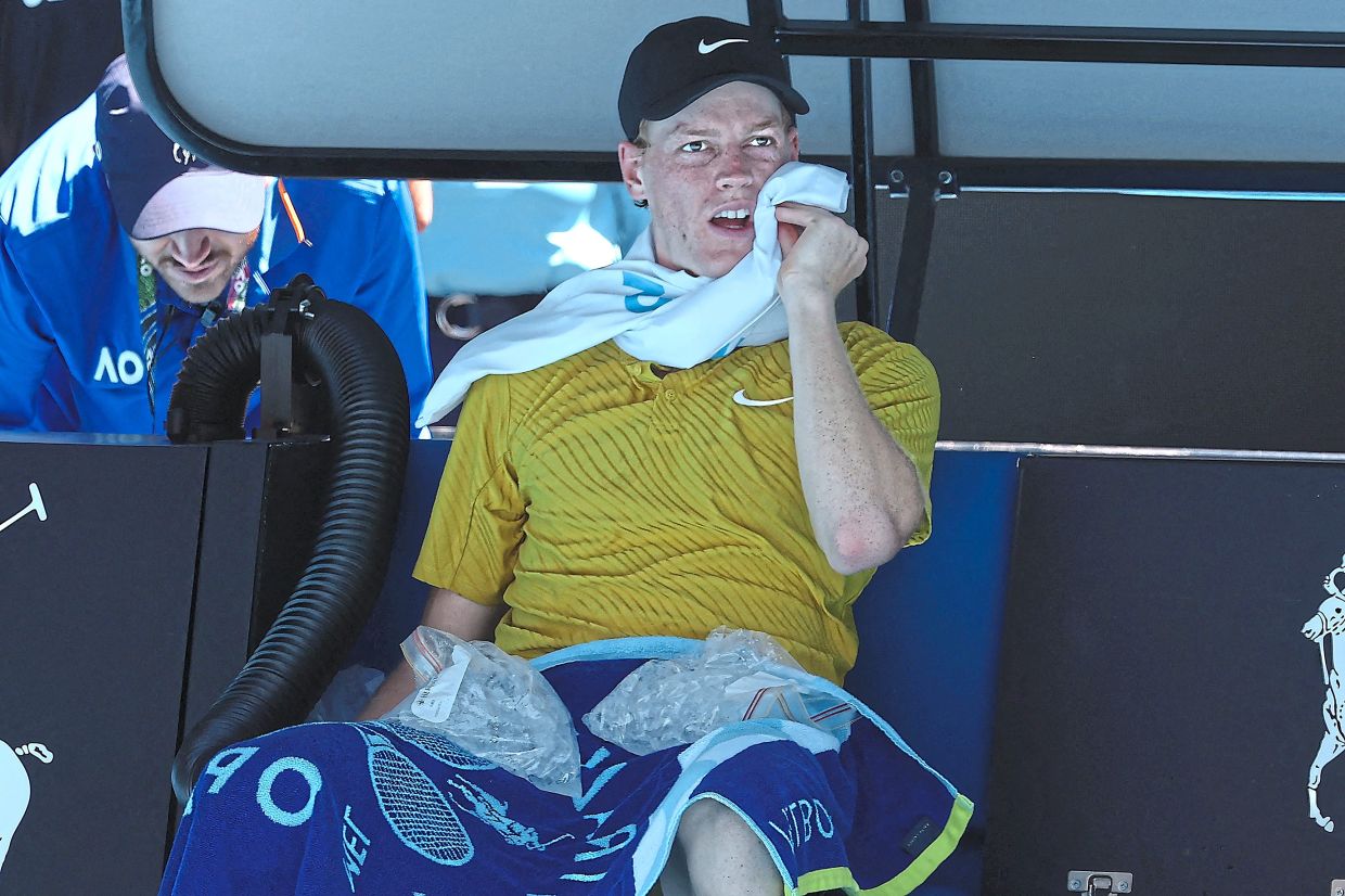 Here’s Italian tennis player Jannik Sinner cooling his body by placing ice packs on his groin. — AFP