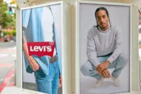 Levi’s lifts sales forecast as shares plunge 5%