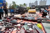 Penang cops crush RM1.27mil in contraband, including 173,000 obscene VCDs, DVDs