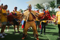 Team colours, bold fits: World Cup fans bring style to the football stands