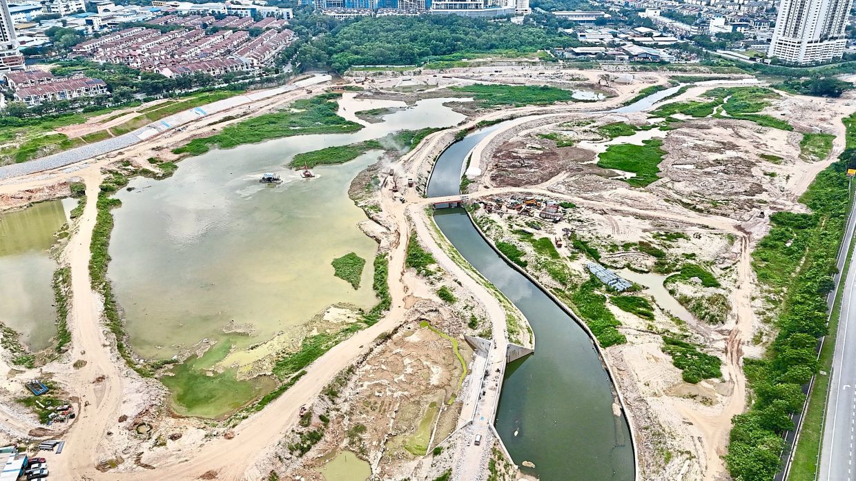 The degazettement of the Kampung Bohol flood retention pond sparked widespread outcry as surrounding residents are concerned over possible reduction of the pond’s capacity. — Filepic