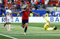 Soccer-Merino's late strike sends Spain past Belgium into World Cup semis