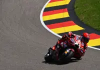 Motorcycling-Marquez snatches German MotoGP pole with new lap record, Bezzecchi withdraws after crash
