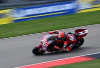 Motorcycling-Marc Marquez cruises to historic sprint victory from pole at German Grand Prix
