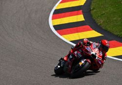 Motorcycling-Marquez snatches German MotoGP pole with new lap record, Bezzecchi crashes again