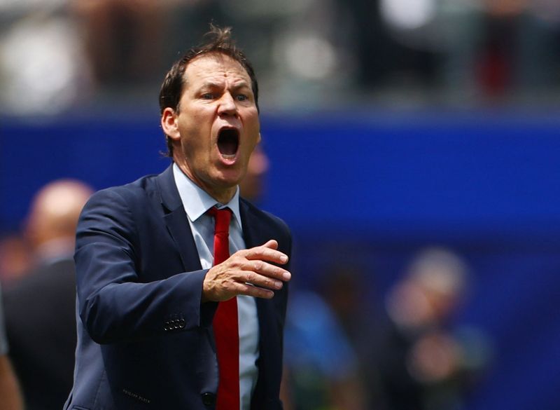Soccer-Belgium coach Garcia's tenure in doubt after Courtois substitution