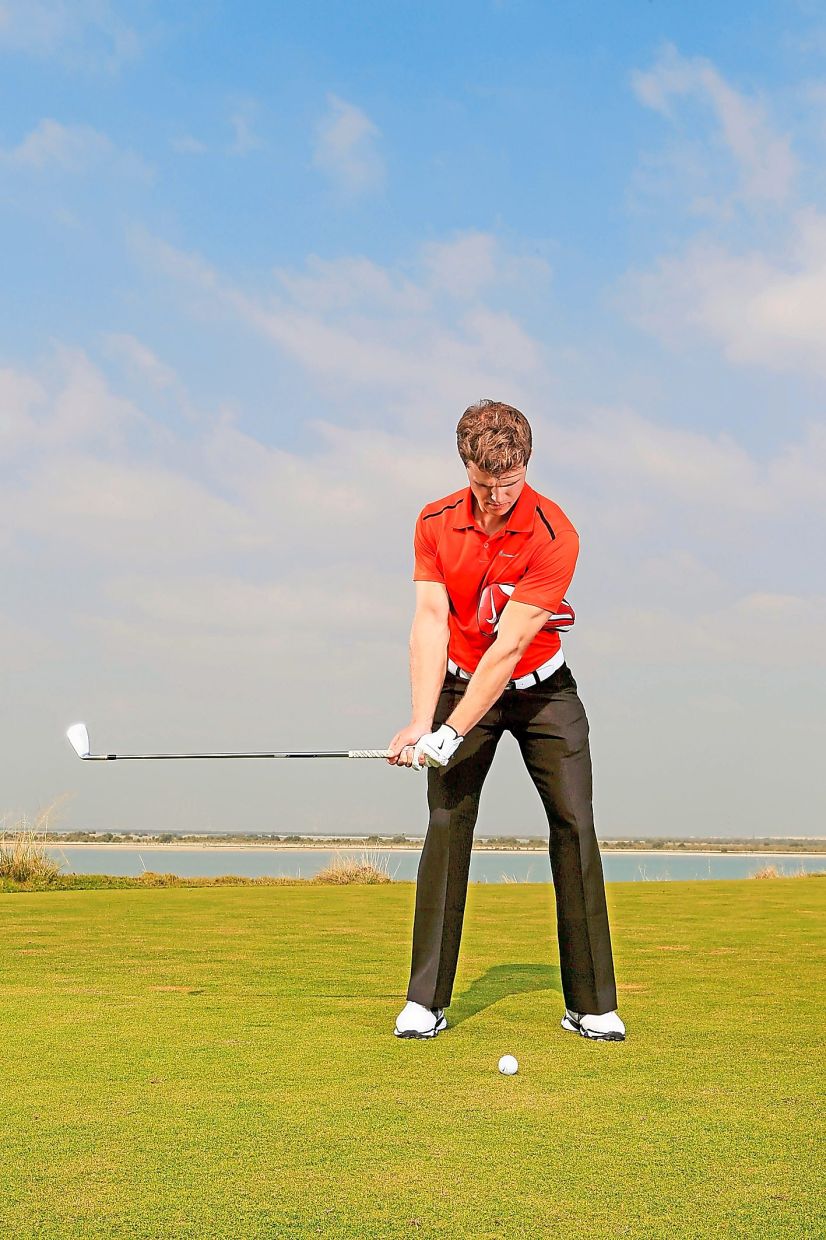 Drill: Headcover under arm Place a headcover or glove under your lead armpit at address. Make a slow takeaway until the club is parallel to the ground and the target line, keeping the same gentle pressure under the arm throughout. This trains the feeling of the arms and torso moving together without squeezing or restricting the motion.
