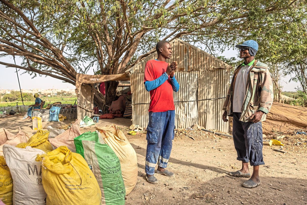 Sow (left) and Farah Jammeh are both exploring local, organic alternatives to chemical fertilisers.