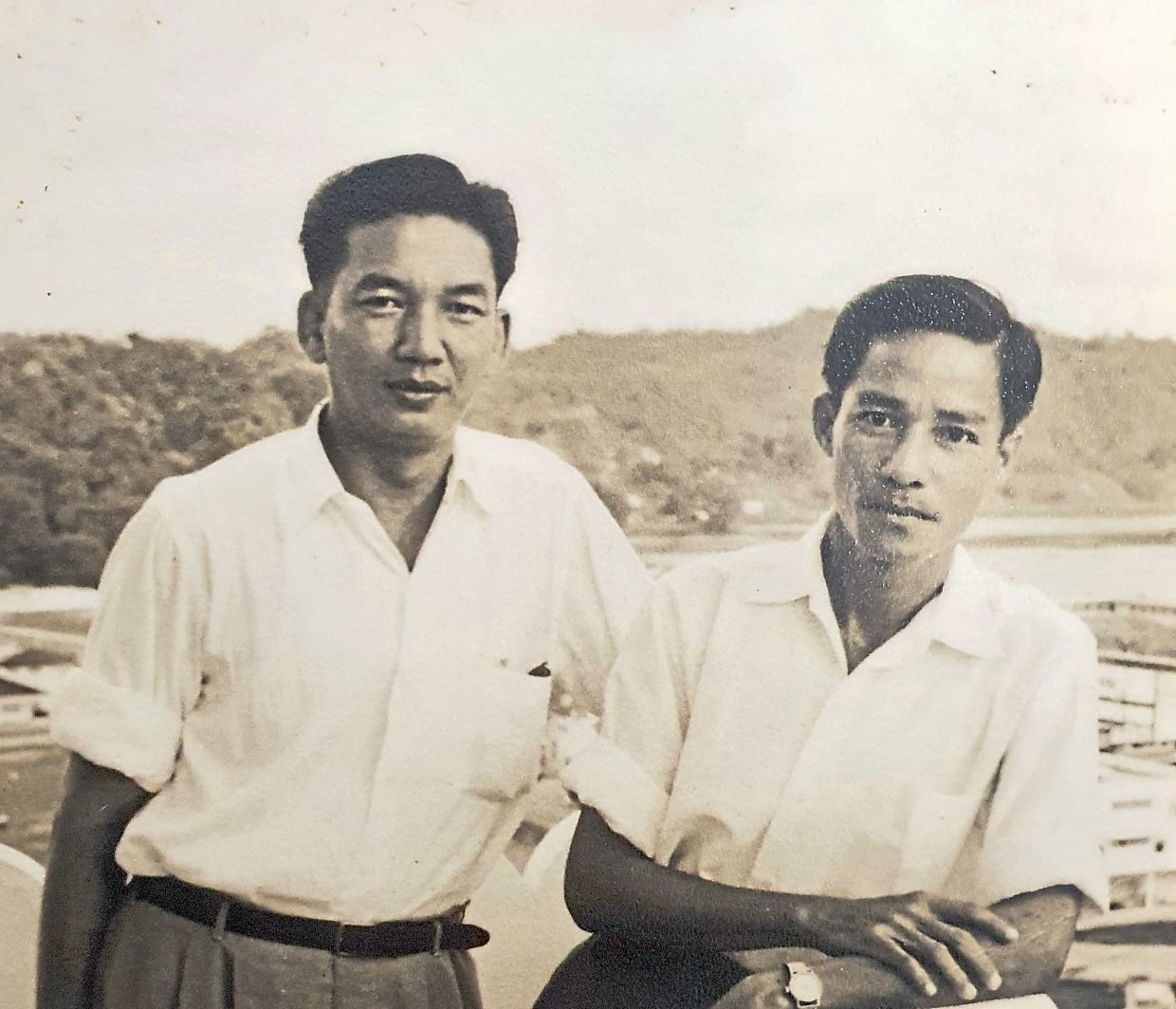 Paul Ong, the author's father, with his dresser colleague.