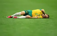 Soccer-Australia's Bos to miss three months for Feyenoord after World Cup knee injury