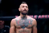 Mixed Martial Arts-McGregor's UFC return halted by knee injury in opening round