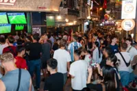 Football fans pack Hanoi’s backpacker streets for World Cup thrillers