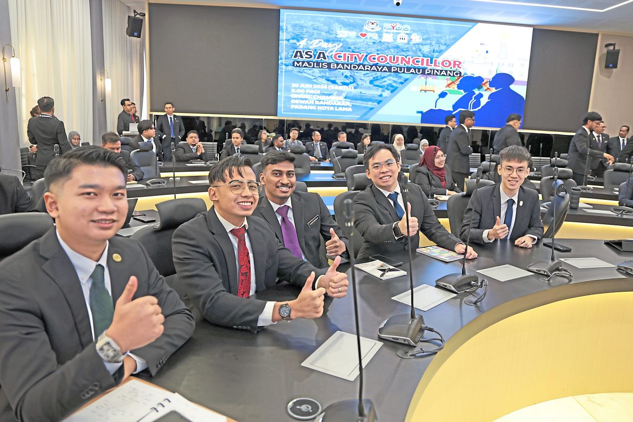 The participants attending a mock monthly council meeting.