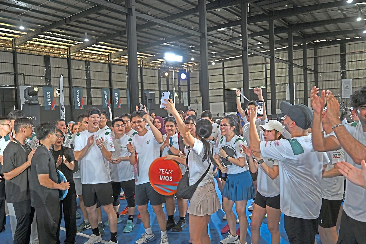 Participants celebrating a hard-earned victory in the 2025 Toyota All-Stars Pickleball Invitational.