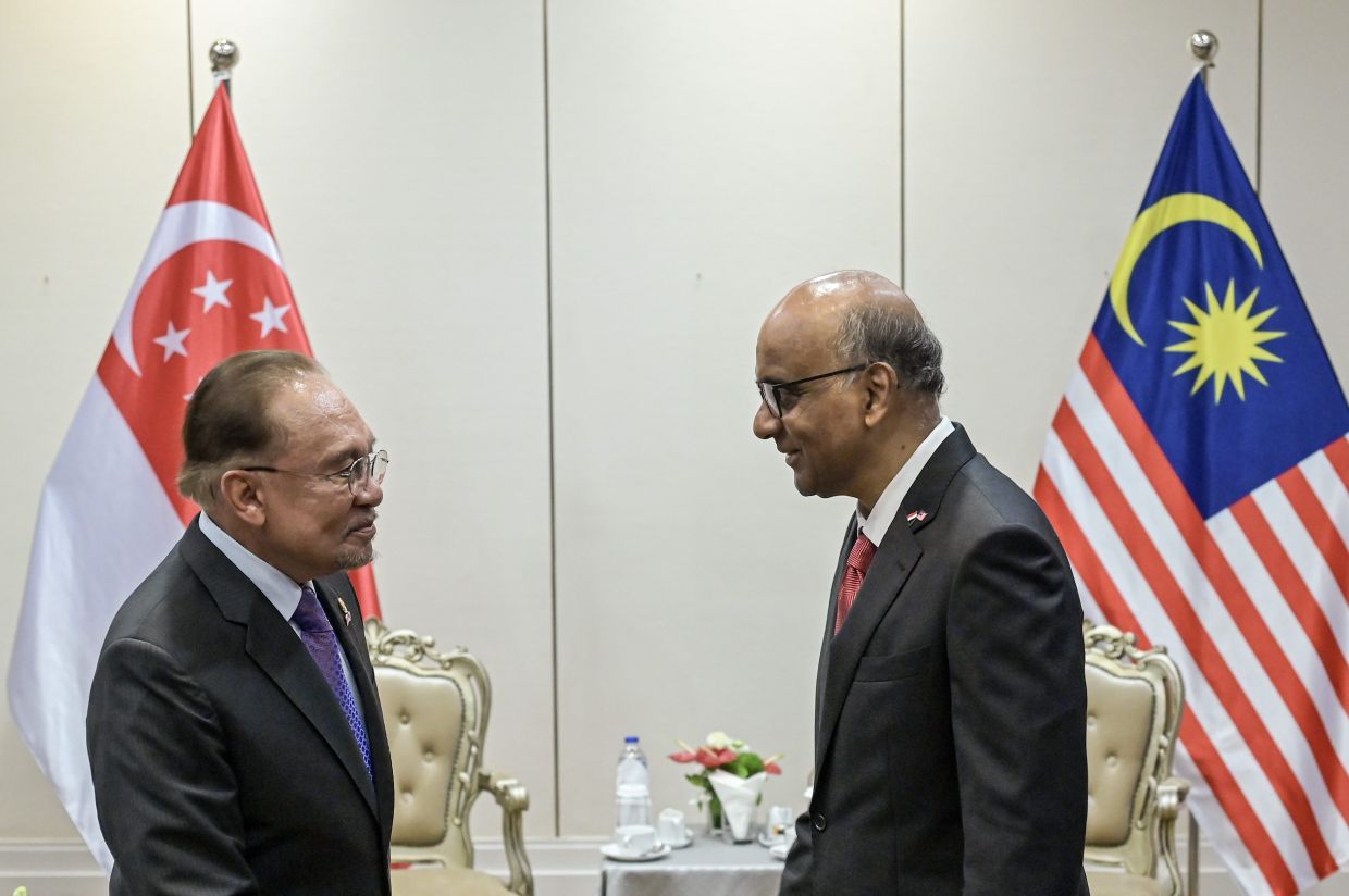 Prime Minister Datuk Seri Anwar Ibrahim (left) receives a courtesy call from Singaporean President Tharman Shanmugaratnam on Monday (July 13) in conjunction with the latter's three-day state visit to Malaysia from July 13 to 15.-- Photo: BERNAMA (2026) 
