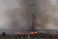 Spanish wildfires claim 13th victim as British woman, 93, dies of injuries