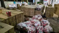 Gujarat police seize Rs1.56 crore liquor haul hidden behind cattle feed