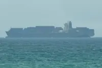 Commercial ship traffic through the Strait of Hormuz falls back to near-record lows