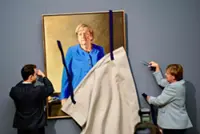If you're in Berlin, the new Merkel portrait is drawing crowds