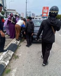 Man killed, wife hurt after being hit by car while crossing road in Melaka