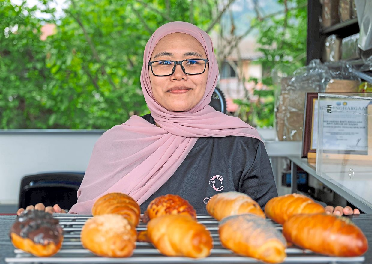 Nor Zakiah says sales soared after moving her salt bread business into a MyKiosk unit in Taman Melawati.