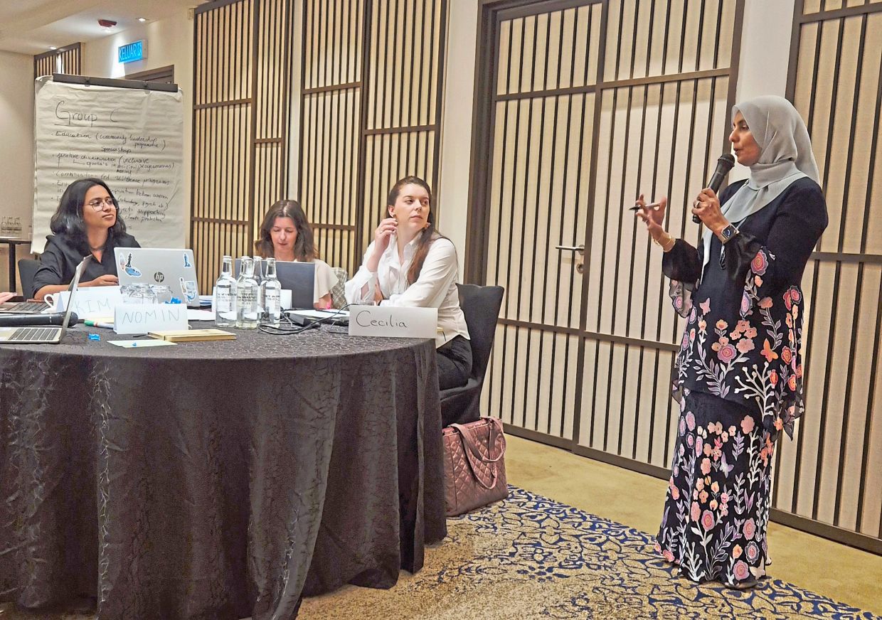 Dr Razwana (right) shares her insights on the evolving nature of security and the importance of diverse perspectives in addressing emerging challenges.