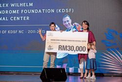 Malaysian teen with Down syndrome takes on 100km run to raise RM50k for charity