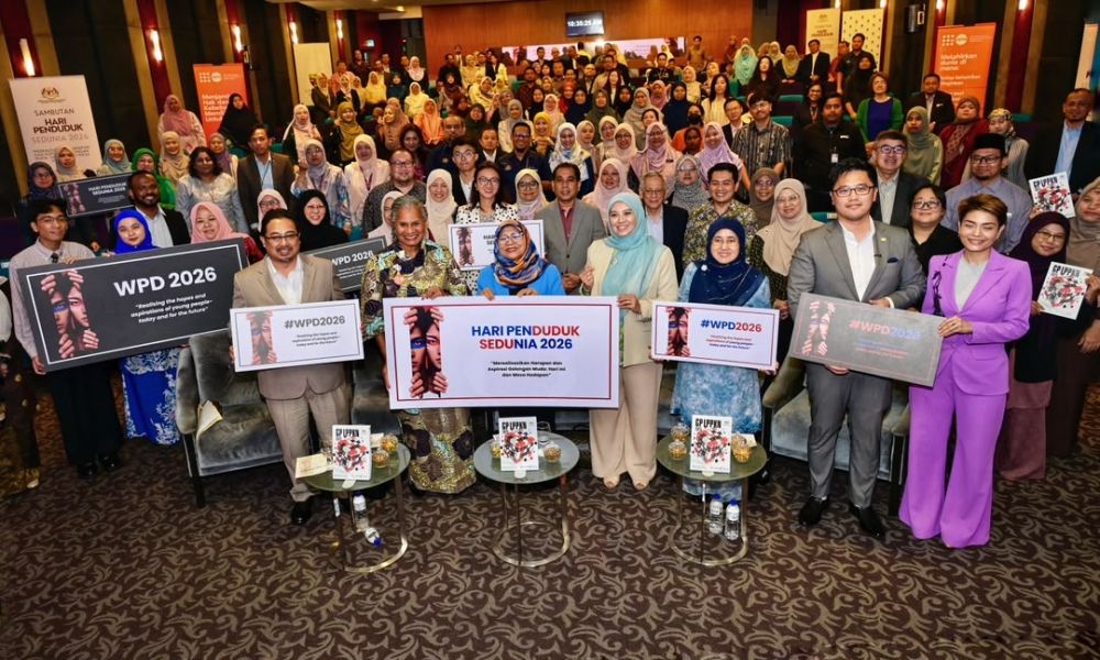 Chairman, LPPKN (National Population and Family Development Board) Datuk Seri Rohani Abdul Karim (front row centre) joined by UNFPA Malaysia representative, Dr. Julitta Onabanjo (front row, 2nd left) and other delegates at the Opening Ceremony of the World Population Day 2026 Celebration,Kuala Lumpur, Tuesday, July 14. — RAJA FAISAL HISHAN/The Star