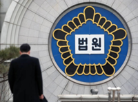 South Korean court acquits defector over money transfers to North