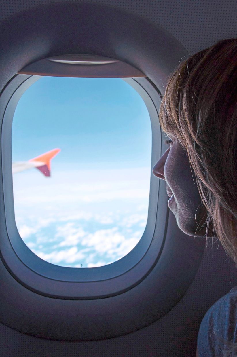 If you’re travelling during the day, and sit by the window on the plane, do use a sunscreen, and reapply every four to five hours for long-haul flights. — Unsplash