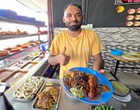 Abang Salah serves nasi kandar