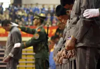 China prosecutes 14,000 over duty-related crimes in first half of this year