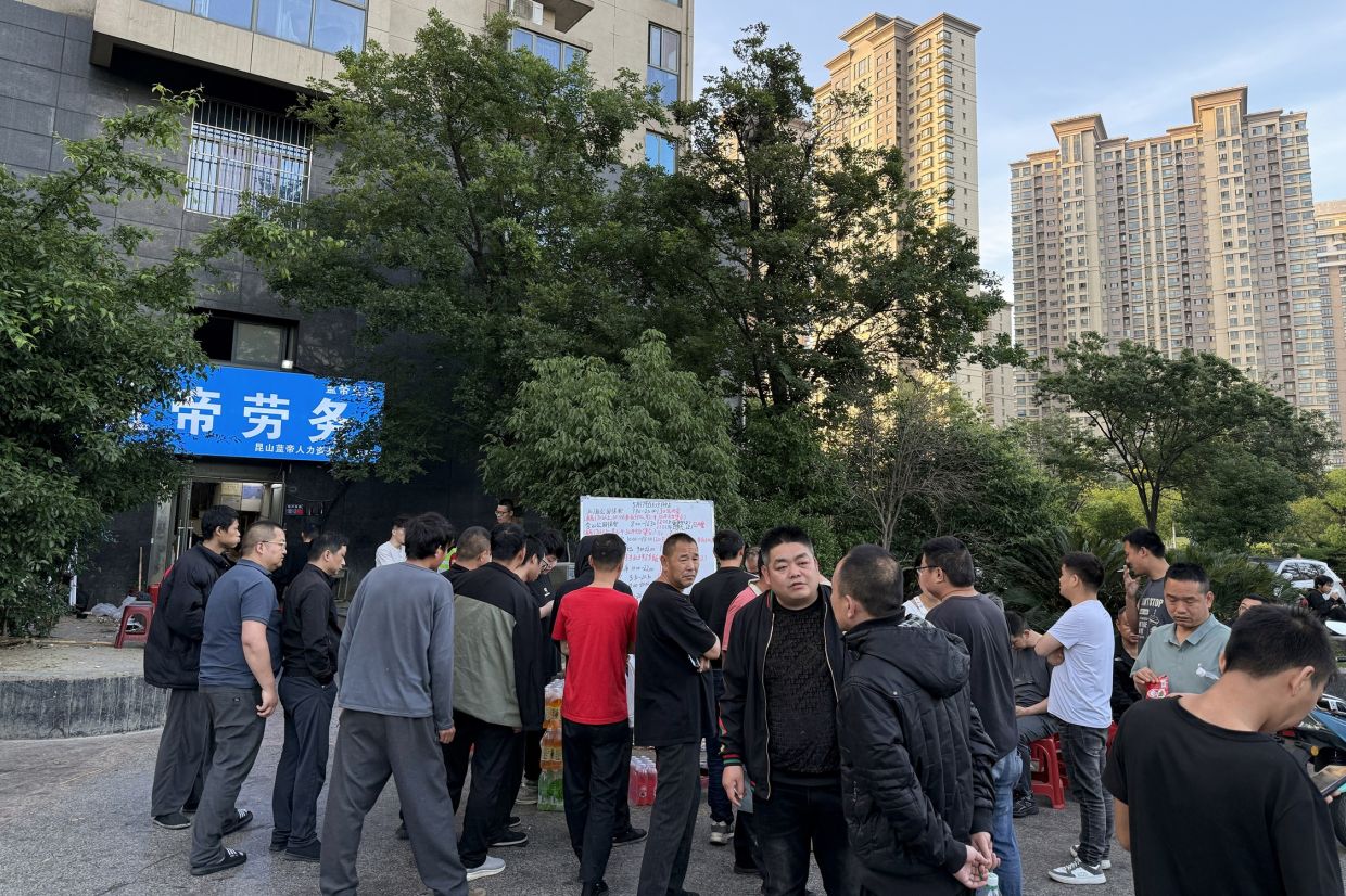 'They don't need people': The workers left behind by China's robot drive