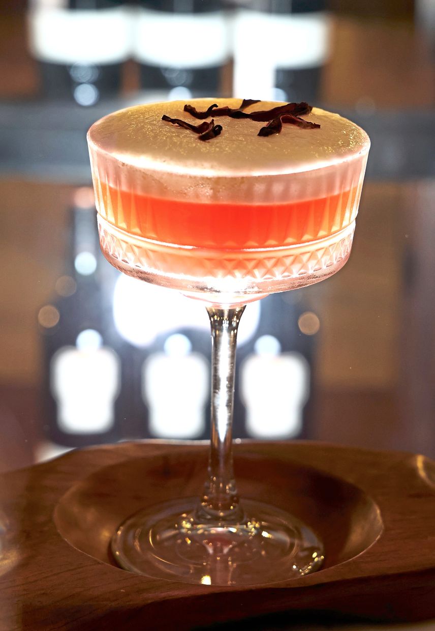 Crimson Elixir has Beefeater gin, pomegranate syrup, ginger syrup and egg white.