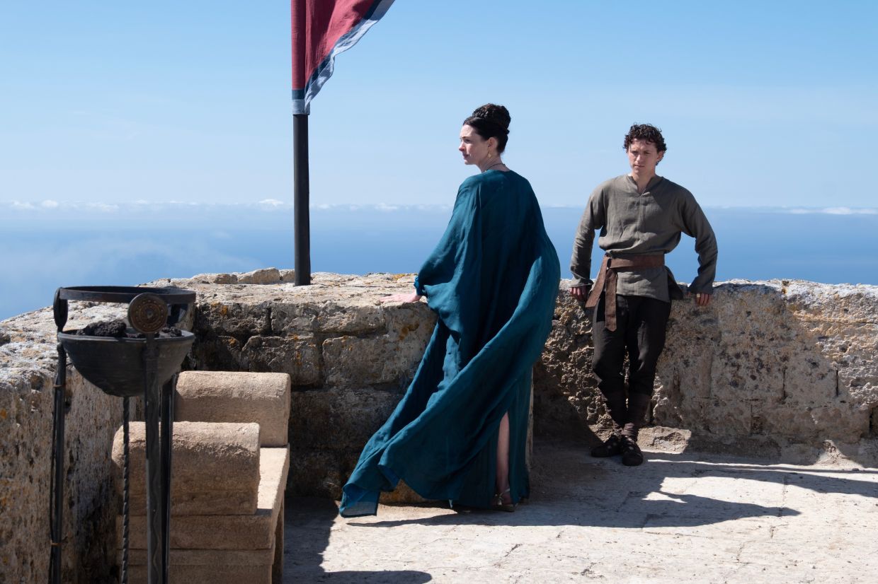 Anne Hathaway as Penelope and Tom Holland as Telemachus, in a scene from 'The Odyssey.'