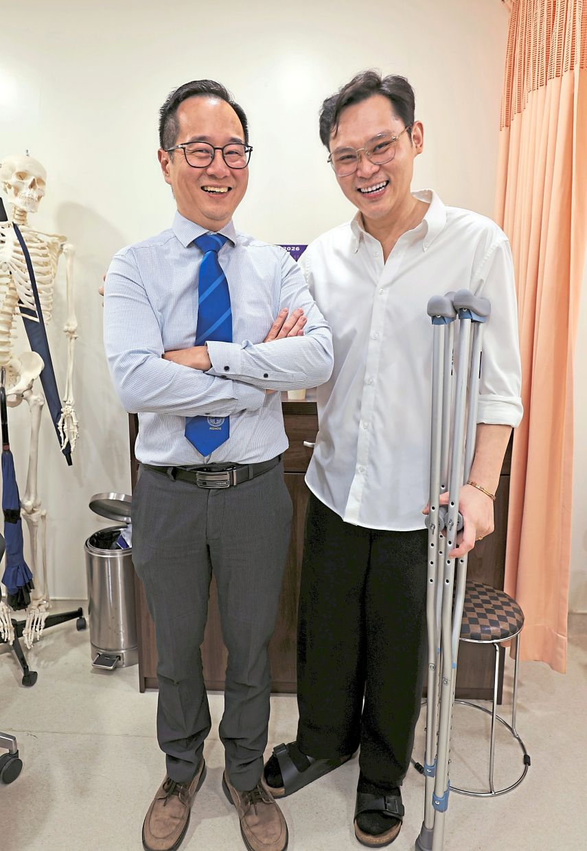 It’s been almost five weeks since Tham (right) had his 11-hour surgery and Dr Choong is delighted that the smile on his patient’s face has returned.