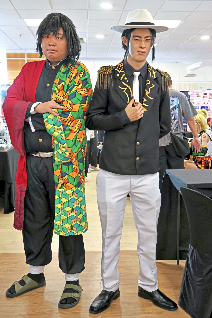 Ooi (right) portrays Demon King Muzan Kibutsuji with Chong as Giyu Tomioka.
