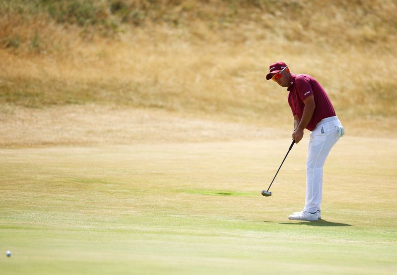 Golf-Herbert 'disappointed' but proud after record-equalling round