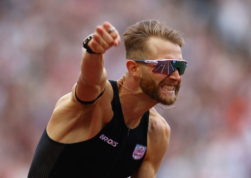 Athletics-Josh Kerr breaks long-standing world mile record