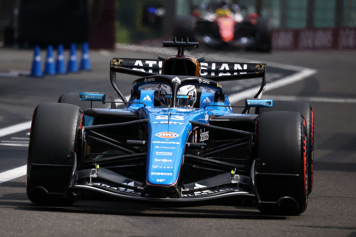 Williams driver Alexander Albon of Thailand in the pitlane during qualification ahead of the Formula One Grand Prix at the Spa-Francorchamps racetrack in Spa, Belgium, on Saturday, July 18, 2026. -- Sarah Meyssonnier, Pool Photo via AP
