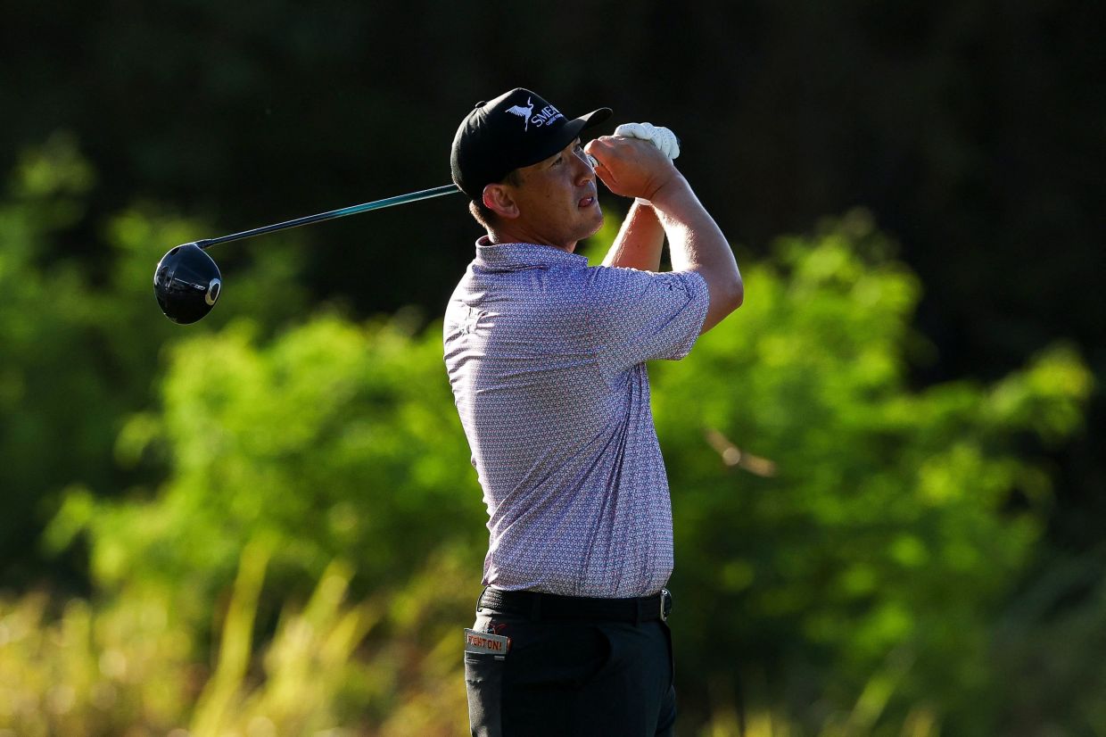 Rico Hoey of Philippines hits a tee shot on the 12th hole during round two of the Corales Puntacana Championship 2026 at Puntacana Resort & Club, Corales Golf Course in Punta Cana, Dominican Republic. -- Andy Lyons/Getty Images/AFP