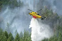 Trump blames Canada for wildfire smoke, says he will add cost to tariffs