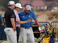 Golf-DeChambeau penalty 'clear cut' says R&A chief