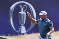 Golf-Burns seizes Open lead, DeChambeau shrugs off penalty to stay in the mix