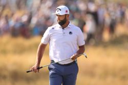 Golf-Rahm given warning after throwing club