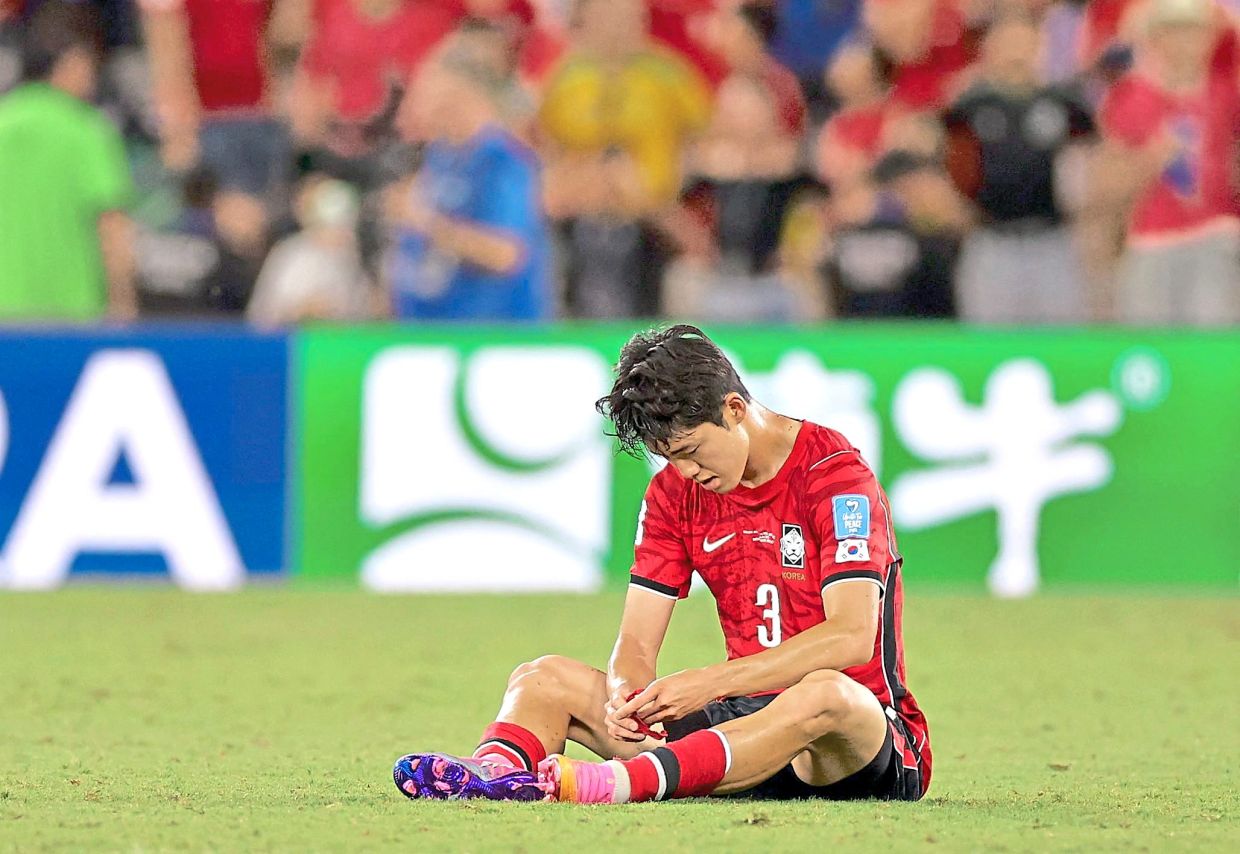 South Korea's defender Lee Gi-hyuk after his team was knocked out of the 2026 World Cup. Haste and impetuosity serve no one. It is high time that Korean society seriously pondered which path forward it will take. — AFP
