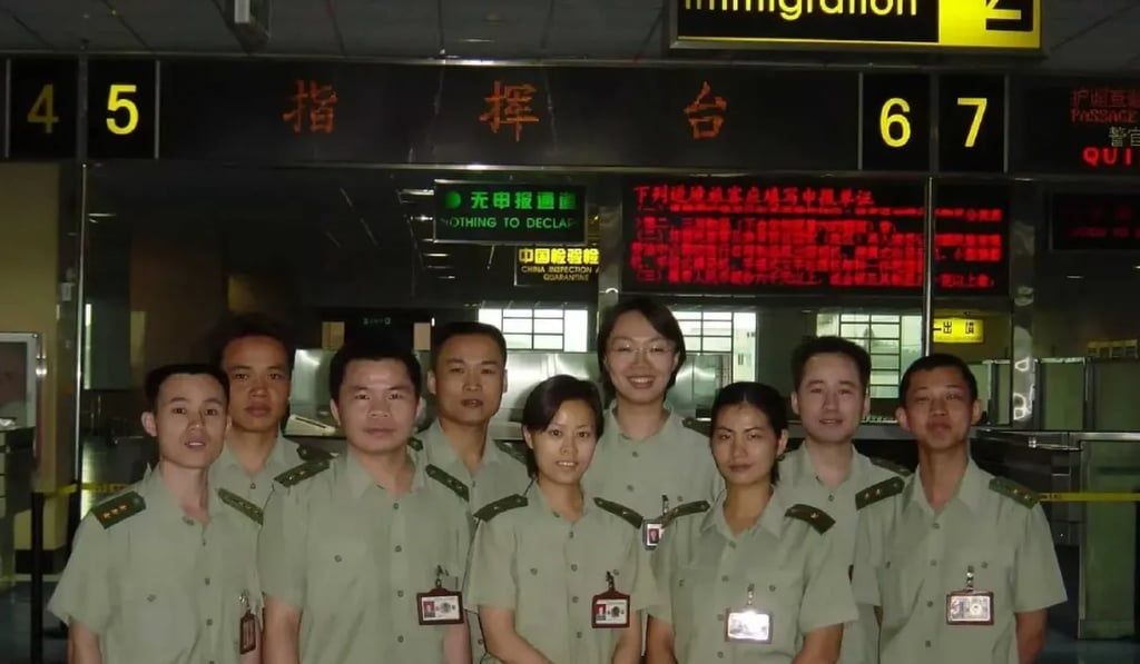 Zhu, third from right, worked closely with Deng, second from right; following his tragic death, she vowed to care for his parents to honour his heroic sacrifice. - Photo: ycwb.com