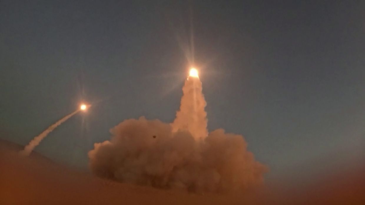Video footage released by Iran's Revolutionary Guards (IRGC)'s Sepah News website allegedly shows missiles being launched from an undisclosed location towards US targets in Bahrain and Kuwait. Iran's Revolutionary Guards said the Hormuz Strait would remain closed until the United States ends its acts of aggression while warning that other regional oil export routes could also become targets. The Guards said they carried out attacks on US military facilities in Bahrain and Kuwait following American strikes on Iranian territory, according to statements by Iranian state television IRIB. -- Photo by SEPAHNEWS.COM / AFP